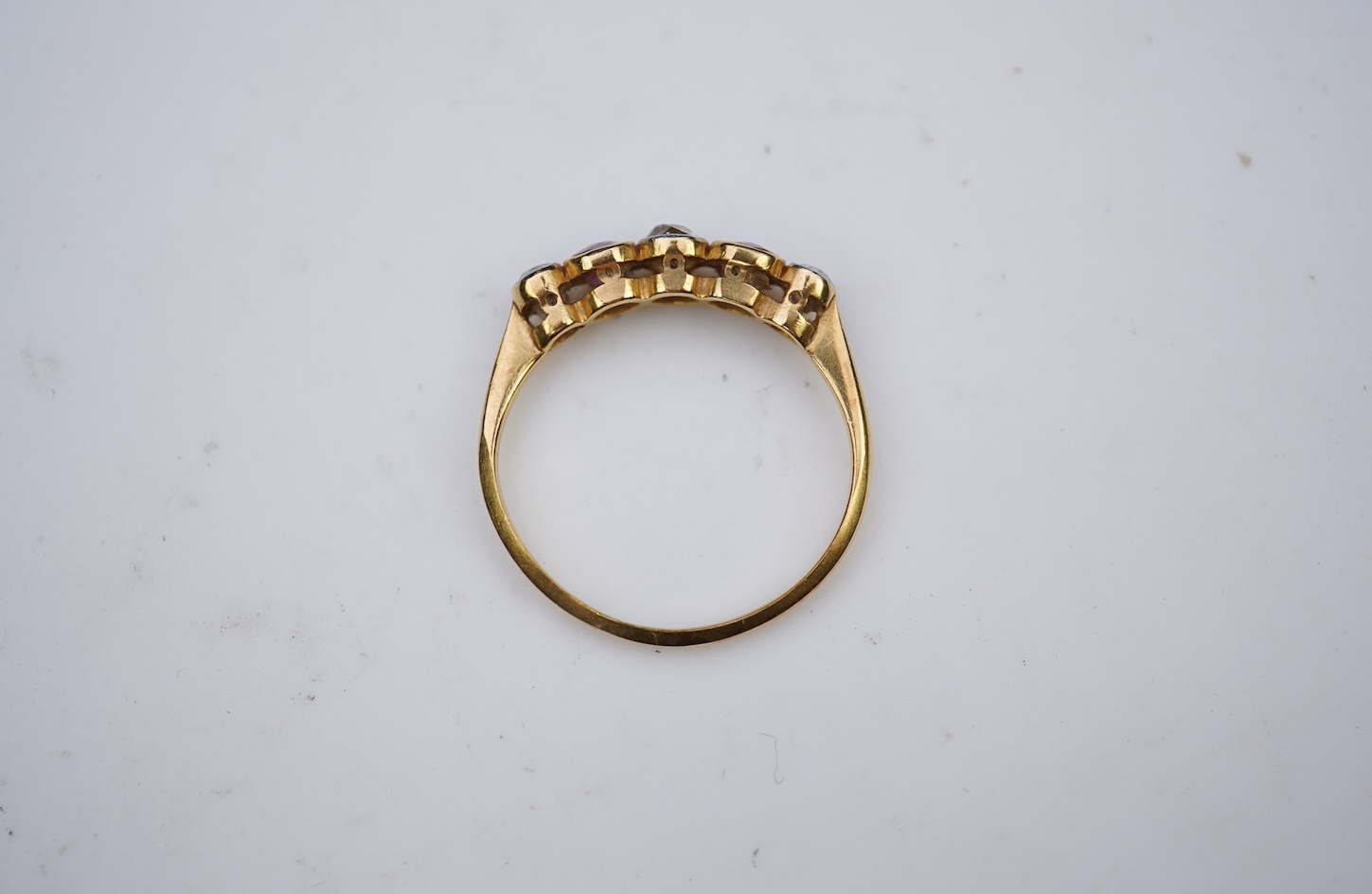 A ruby and diamond five-stone ring, early 20th century